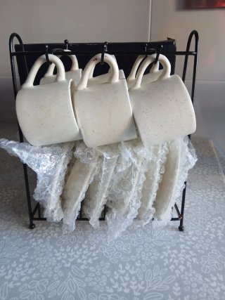 Juego de tazas de café con platillos