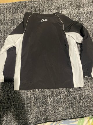 Chaqueta Cortavientos Bicolor Negra y Blanca con C