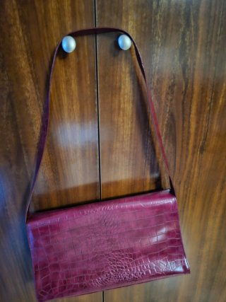 Bolso de mano piel cocodrilo rosa