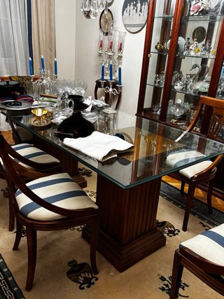 Mesa de comedor de cristal y madera
