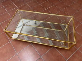 Mesa centro cristal y metal dorado