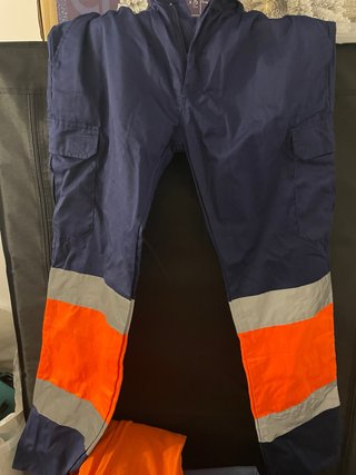 Pantalón de trabajo reflectante azul y naranja