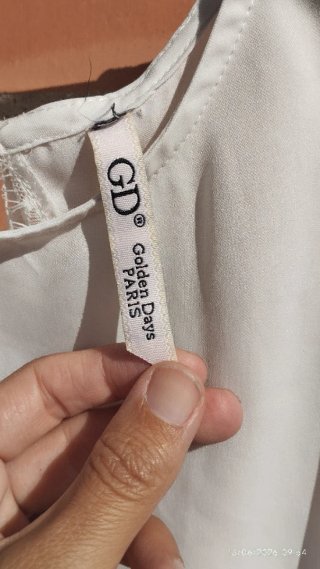 Blusa blanca talla 38 con abertura espalda