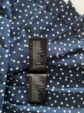 Falda plisada de lunares azul marino | H&M Divided