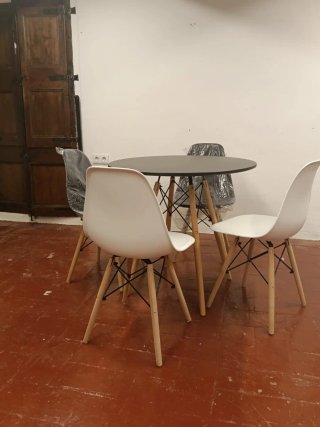 Mesa redonda negra patas madera