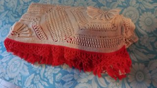 Colcha ganchillo beige con borde y flecos naranja