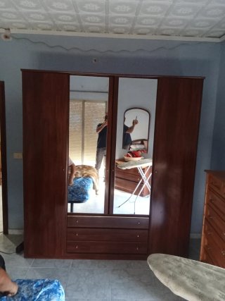 Mesa de comedor ovalada y 6 sillas