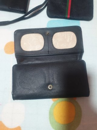 Cartera multicolor con diseño floral