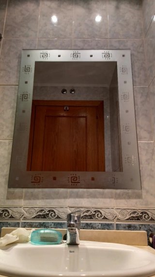 Espejo decorativo con diseño