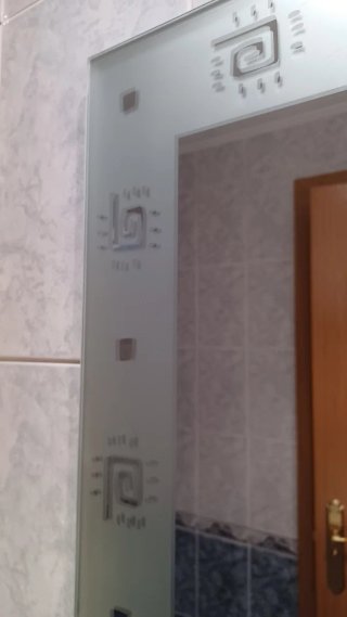 Espejo decorativo con diseño