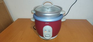 Arrocera Oster 0.6L con Vaporera