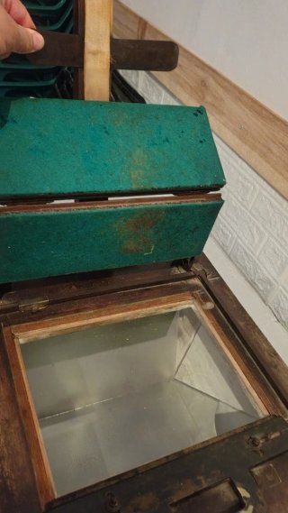Prensa de contacto fotográfica.