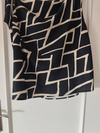 Blusa de mangas y cuello asimétrico XL nueva