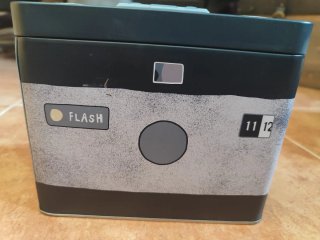 Caja chapa diseño cámara fotos