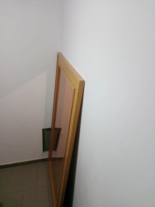 Espejo grande de madera y cristal