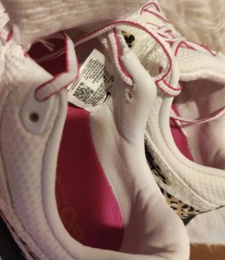 Scarpe da ginnastica Nike da donna con leopardo