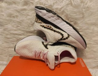 Scarpe da ginnastica Nike da donna con leopardo