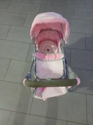 Cochecito de muñecas rosa
