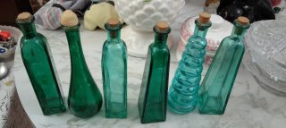 Juego de 6 botellas de vidrio verdes