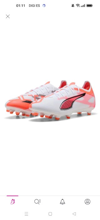 Botas de fútbol Puma negras y naranjas