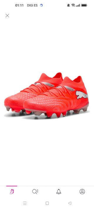 Botas de fútbol Puma negras y naranjas