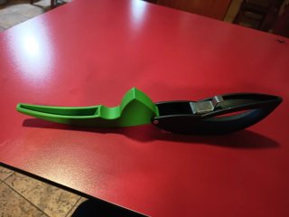 Prensador de ajos Tupperware verde y negro