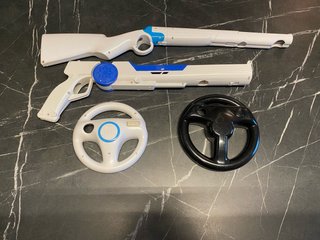 Accessori Wii: Pistola, Fucile e Volante