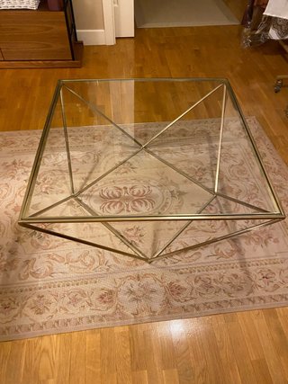 Mesa de centro cristal y metal dorado
