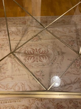 Mesa de centro cristal y metal dorado