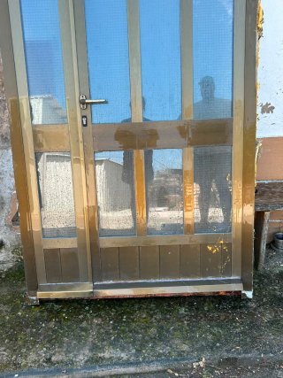 Puerta aluminio doble cristal abatible