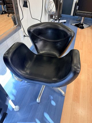 Sillón de peluquería negro