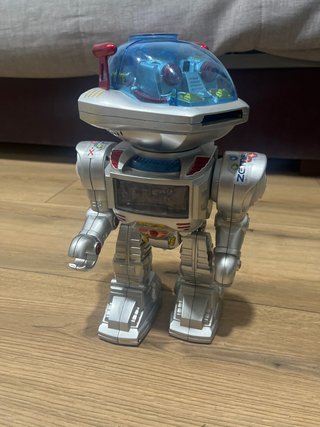 Robot Juguete Camina y Dispara Discos