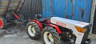 Tractor Ferrari 32CV con remolque