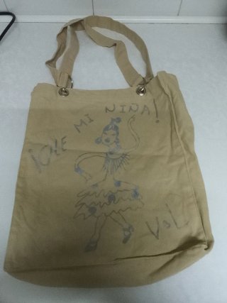 Bolso de tela beige con dibujo