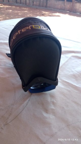 Soporte bidón y bolsa bici carretera