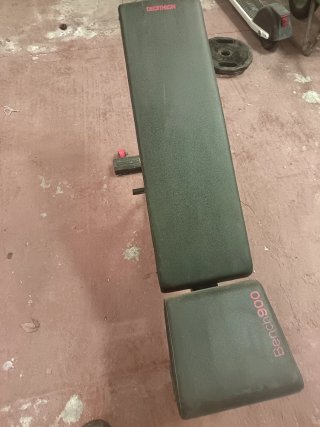 Banco de pesas Bench900 y 2 discos 15kg