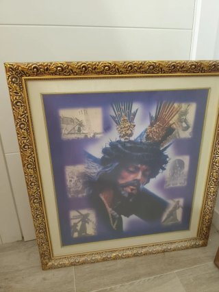 Cuadro religioso dorado con marco