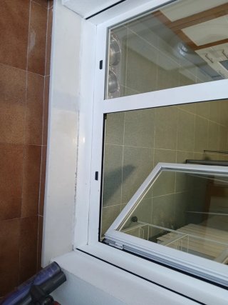 Ventana doble con persiana