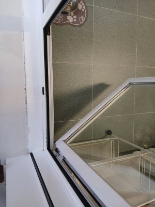Ventana doble con persiana