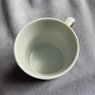 Taza de té oriental con colador