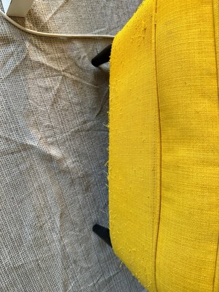 Sillón individual amarillo de tela