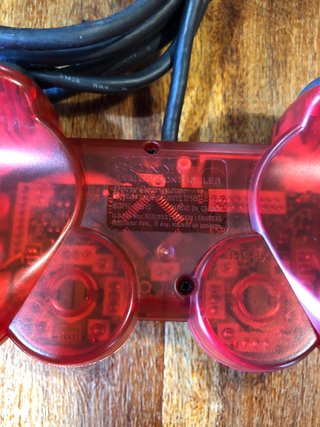 Controller PS2 rosso trasparente pad