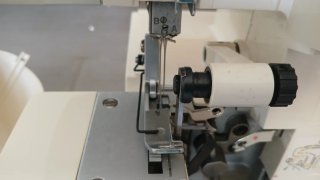 Máquina Overlock Singer 14SH754