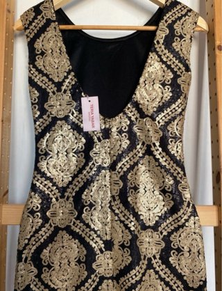 Vestido fiesta negro y dorado con etiqueta