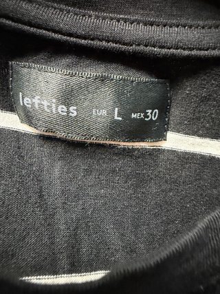 Camiseta de rayas negra y blanca Talla L