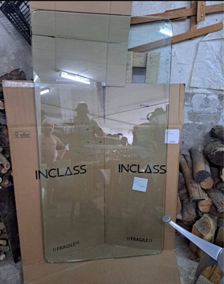 Mesa de comedor de diseño cristal y metal