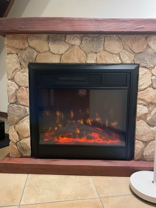 Caminetto elettrico effetto pietra e legno