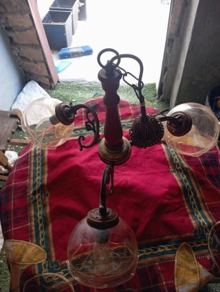 Lámpara retro dorada y transparente