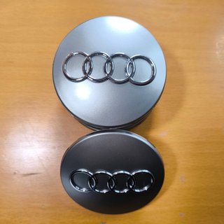 TAPABUJES AUDI 68mm GRIS - EMBLEMA LLANTAS AUDI