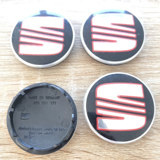 TAPABUJES SEAT 56mm NEGROS CON EMBLEMA PLATA ROJO
